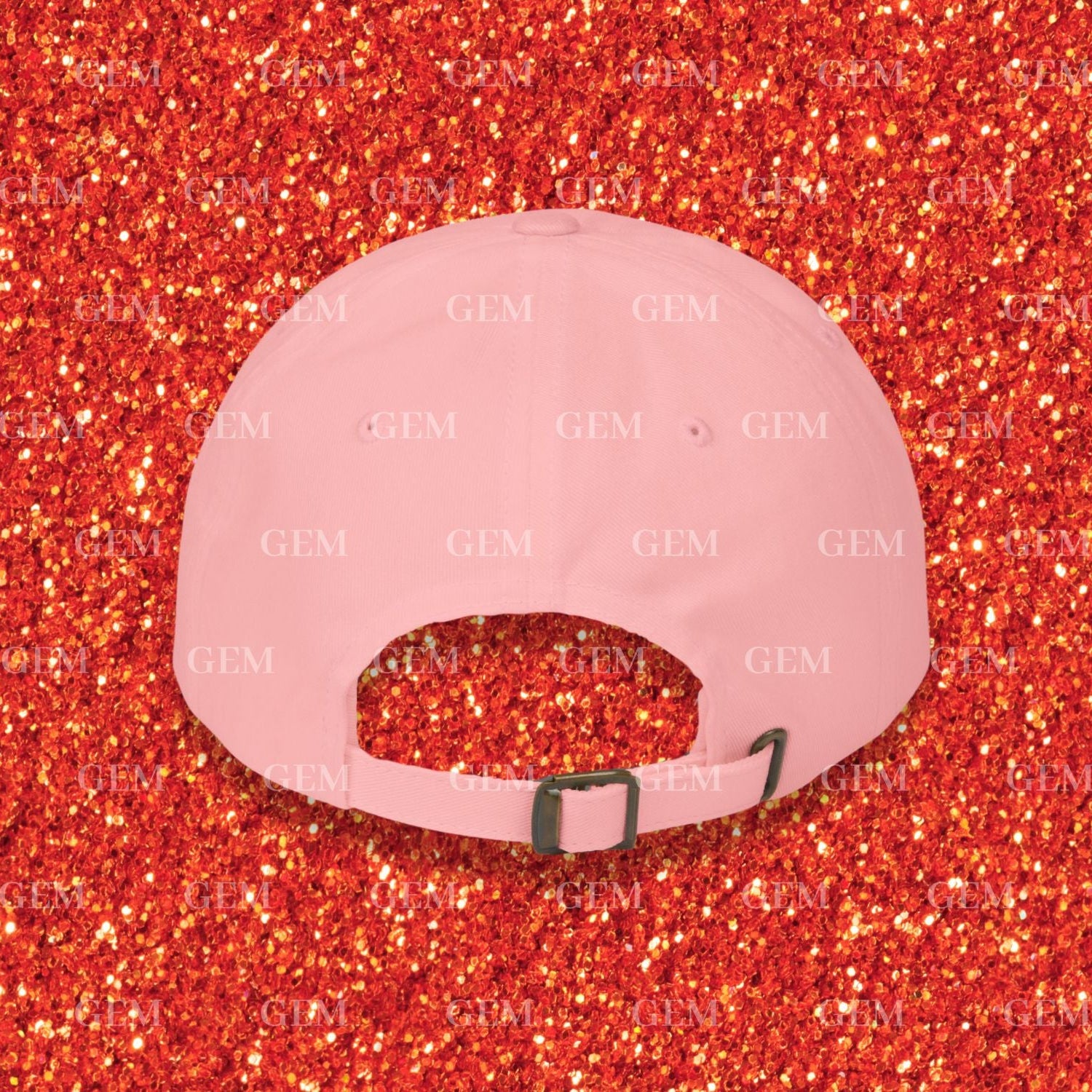 Pink cap on a red glittery background with 'GEM' branding.