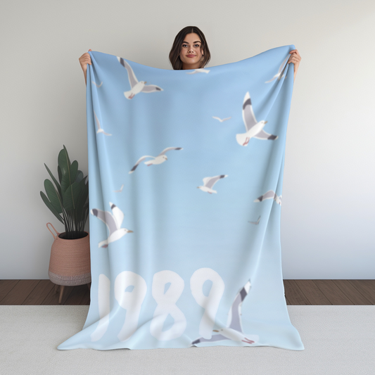 '89 tv-inspired blue sky seagull velveteen blanket