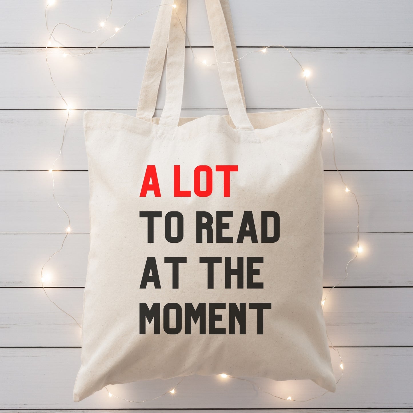 a lot to read at the moment tote bag