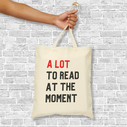 a lot to read at the moment tote bag